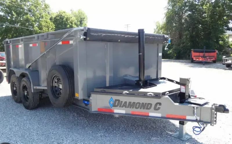 A Barnes roll-off dumpster on site